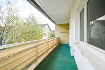 Renovierungsbedürftige 4-Zimmer Wohnung mit Sonnenloggia in begehrter Wohnlage von Bonn-Hochkreuz - Impression Balkon