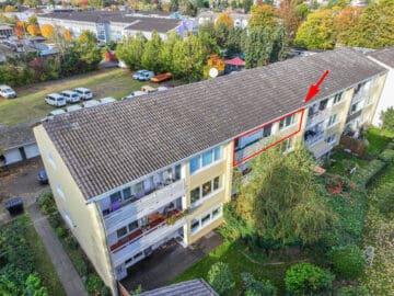 Renovierungsbedürftige 4-Zimmer Wohnung mit Sonnenloggia in begehrter Wohnlage von Bonn-Hochkreuz - Impression Außenansicht
