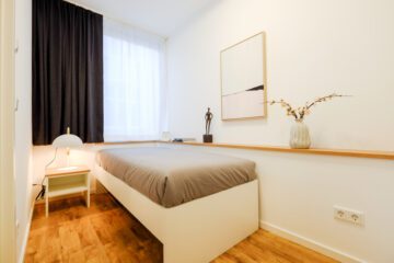 Neuwertige und schick möblierte 2-Zimmer-Wohnung in der Fußgängerzone von Bad Honnef mit Stellplatz - Impression Schlafzimmer
